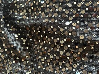 Top lentejuelas negro con una manga. Inter gasa