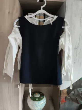 Blusa negra y blanca con mangas