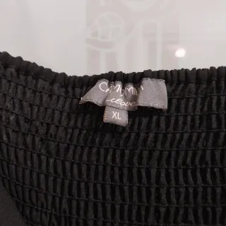 Abito elegante nero e oro