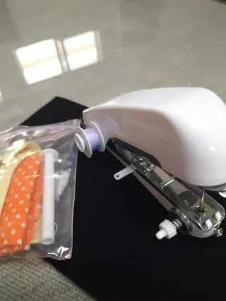 Máquina de coser portátil