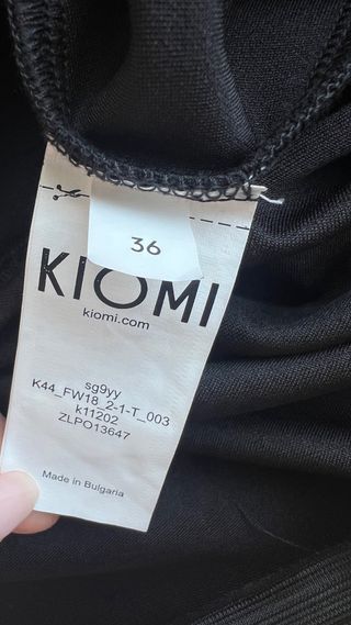 Mono negro tirantes con cinturón “Kiomi”