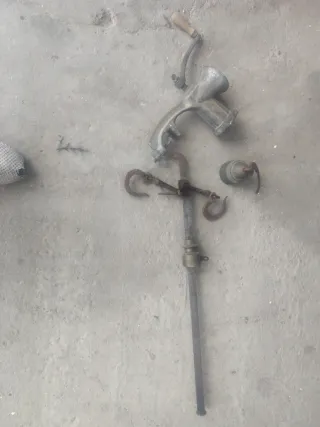 Romana antigua y picadora carne