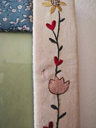 Portafoto in stoffa ricamata con fiori