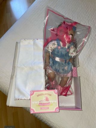 Lote Muñeca Reborn con mucha Ropa
