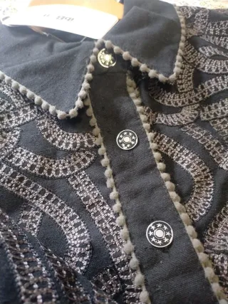 Chaqueta ibBan negra y gris