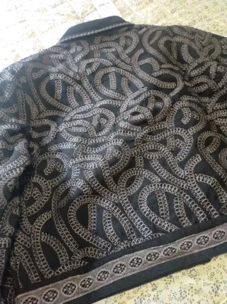 Chaqueta ibBan negra y gris