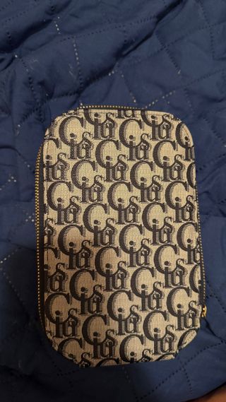 Riñonera nueva azul y dorada