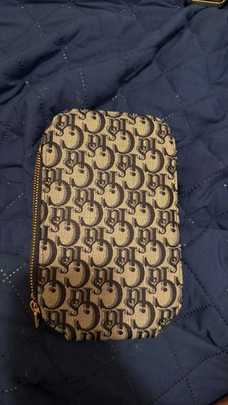 Riñonera nueva azul y dorada