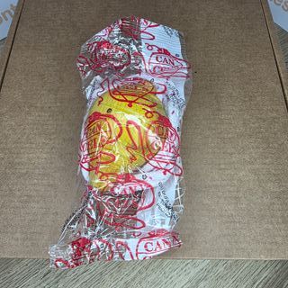 Peonza de madera amarilla