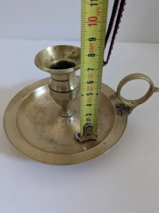 Palmatoria antigua de bronce