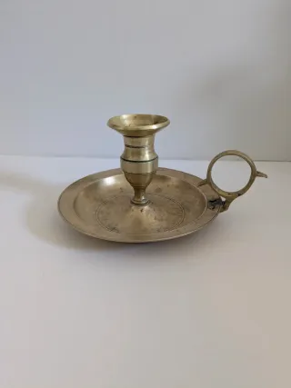 Palmatoria antigua de bronce