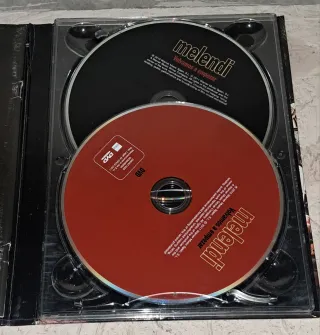 DIFÍCIL Y RARO CD+ DVD Melendi Volvamos a empezar.