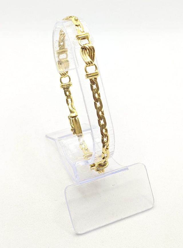 Pulsera Barbada de oro de 18k, 12.13 g, 18.5 cm.