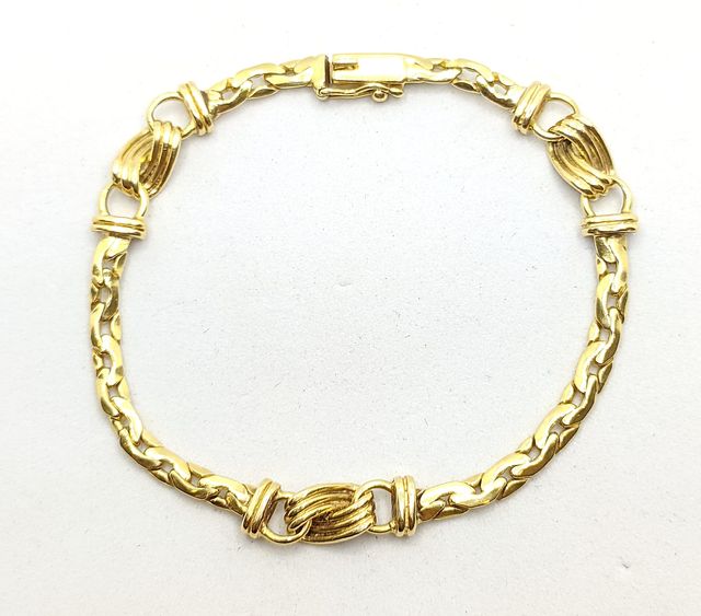 Pulsera Barbada de oro de 18k, 12.13 g, 18.5 cm.