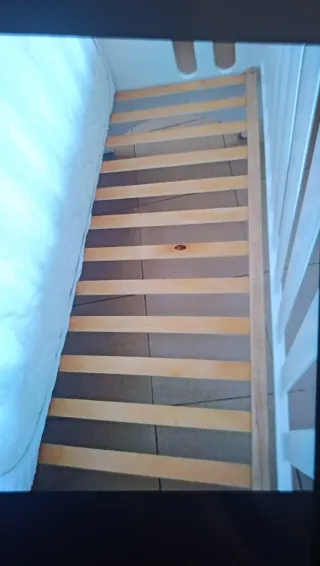 Cuna infantil blanca con osito