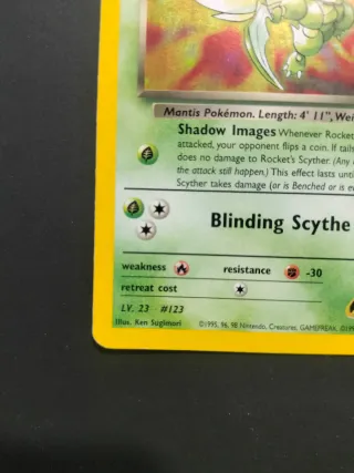 Carta Pokémon Rocket's Scyther 13/132