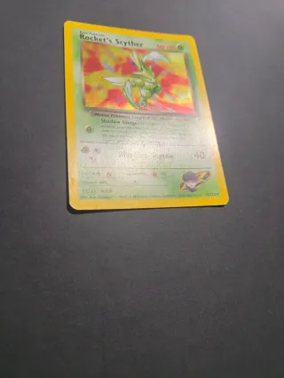 Carta Pokémon Rocket's Scyther 13/132