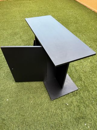 Mueble negro con cajón