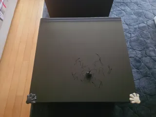 Mesa de centro madera maciza y cristal negro,