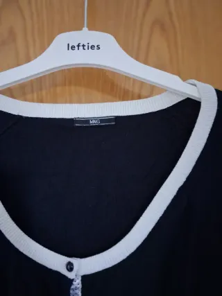 Rebeca chaqueta punto elegante negro y blanco