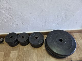 Barra de pesas y discos gimnasio