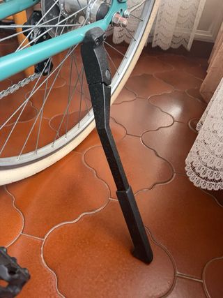 Bicicleta estilo holandesa verde.