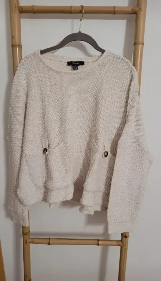 Jersey punto beige con bolsillos