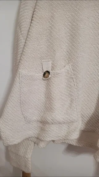 Jersey punto beige con bolsillos