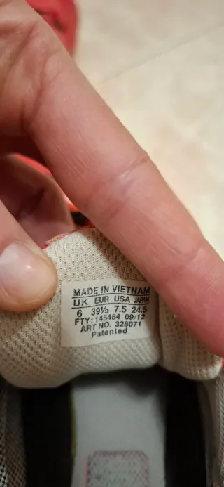 Zapatillas Trail Salomon Rojas y Naranjas