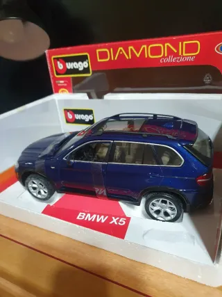 BMW X5  Bburago Scala da  1/19
