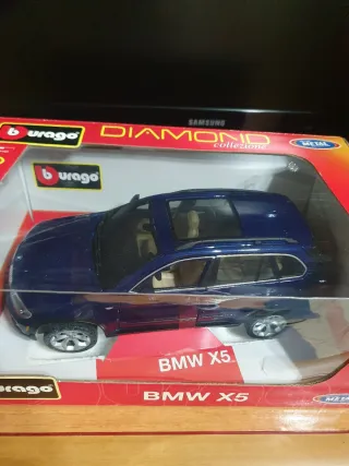 BMW X5  Bburago Scala da  1/19