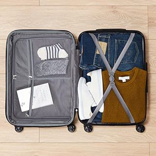 Amazon Basics Equipaje de mano rígido expandible: maleta de viaje ABS con 4 ruedas giratorias dobles; diseño ligero y resistente a los arañazos, 37,5 x 25,5 x 55 cm, azul marino NUEVO