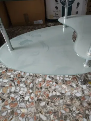 Mesa de centro cristal y metal ovalada