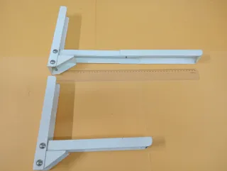 Soporte vertical metálico para tabla o estantería
