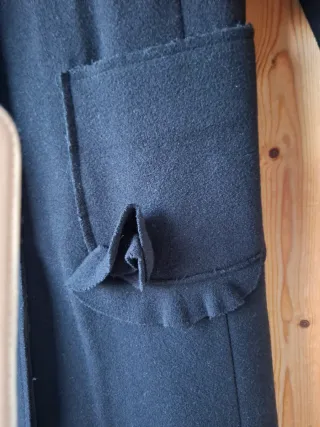 Cappotto nero con pelliccia