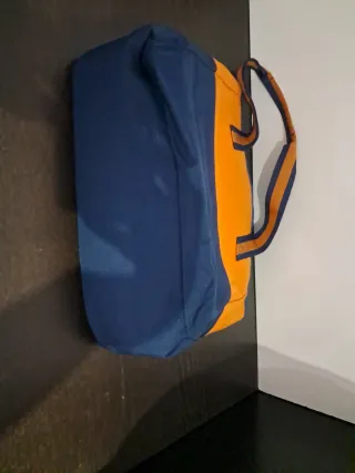 Bolsa de tela reversible Billabong naranja y azul