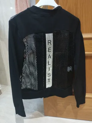 Cazadora de rejilla negra