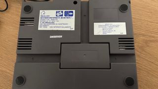 Consola Nintendo NES con mandos y juegos