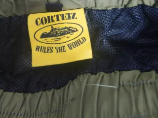 Pantalón corto Corteiz Alcatraz Verde Militar Tall