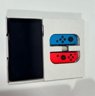 Nintendo Switch OLED + Mario Kart 8 + Volantes