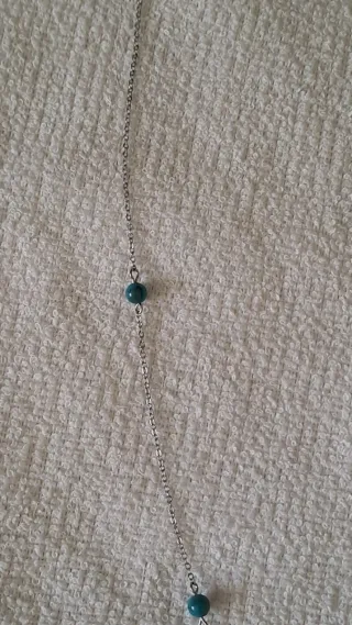 Collana lunga con perline turchesi