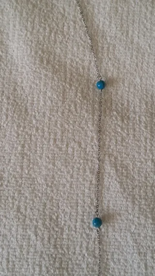 Collana lunga con perline turchesi