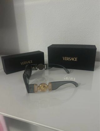 Occhiali da sole Versace grigi e dorati