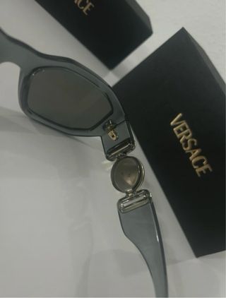Occhiali da sole Versace grigi e dorati