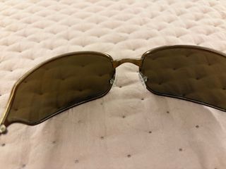 Gafas de sol Prada doradas