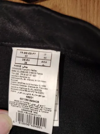 Falda negra midi con cremallera