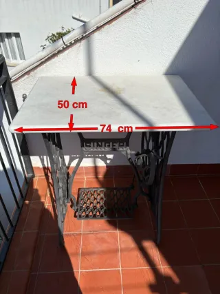 Mesa jardín de hierro fundido y mármol