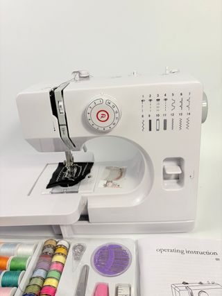 Máquina de coser eléctrica + kit hilos