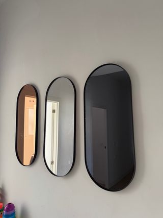 Tre specchi decorativi ovali