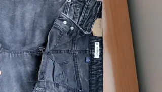 Pantalón skinny gris talla 34